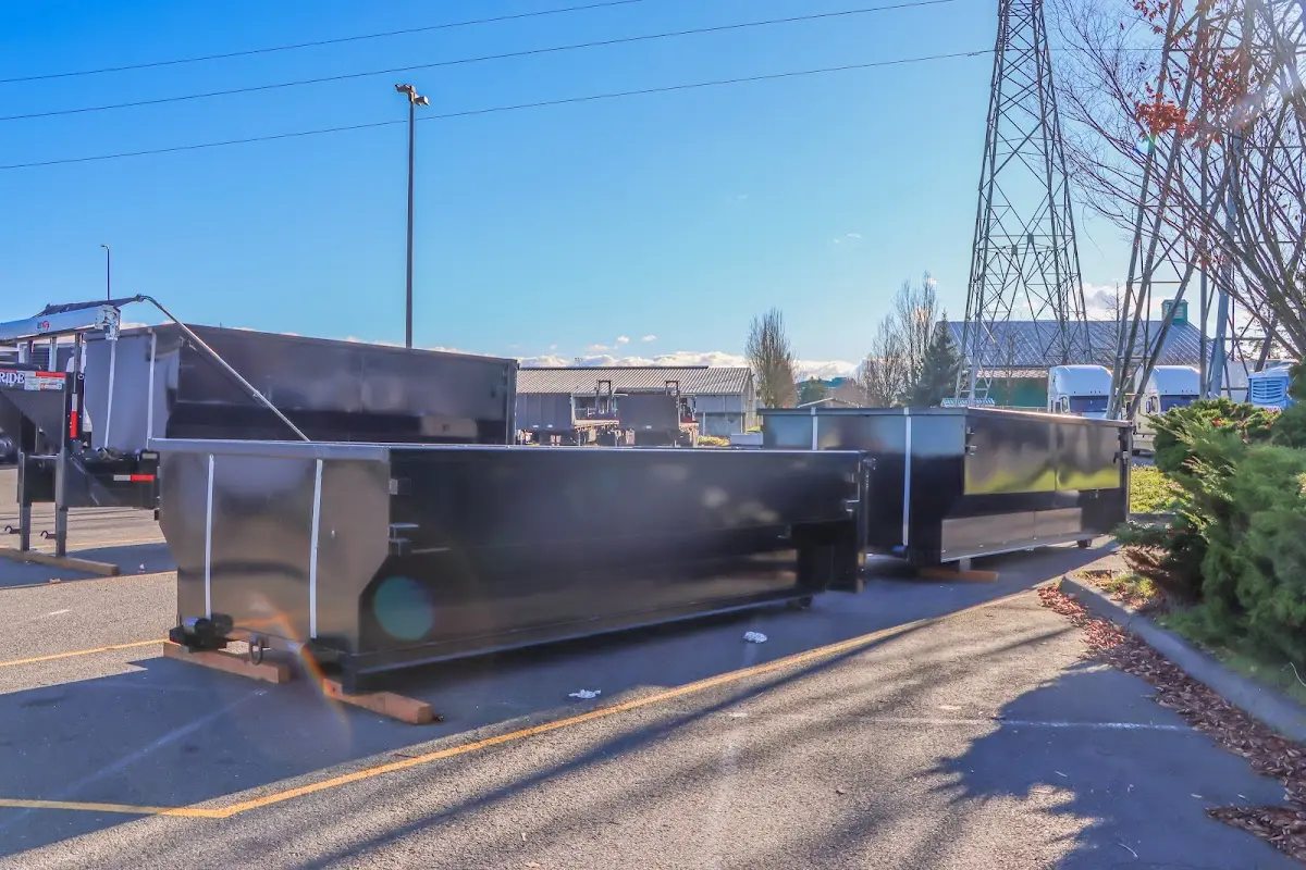 Roll-off dumpster ready for waste disposal at job site for Concrete Dumpster Rental in Prichard